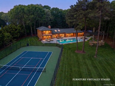 A sweeping circular driveway welcomes you to this ultra-private - photo 7