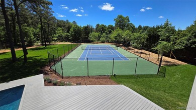 A sweeping circular driveway welcomes you to this ultra-private - photo 8