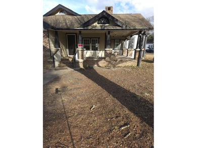Investor Special | Fix & Flip Opportunity | 3BR / 2BA | 0.34 - photo 2
