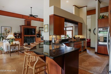 Nestled on a private one-acre corner property within the - photo 12
