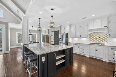 Wake up to lake breezes and endless entertaining possibilities - photo 13