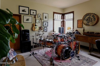 Nestled on a private one-acre corner property within the - photo 22