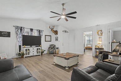 This beautifully updated cedar home perfectly blends rustic - photo 3