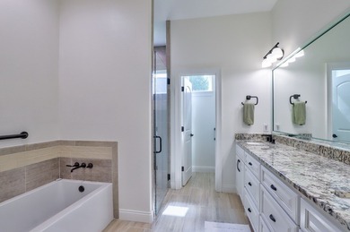 Welcome to this stunning stone and stucco Mediterranean-style