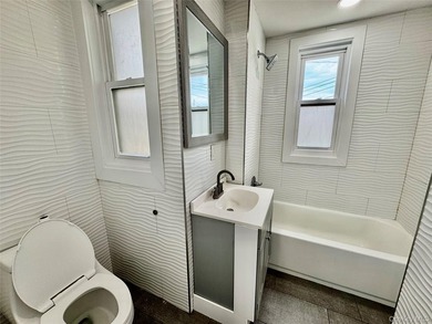 Welcome to this income-producing residential property in the - photo 16