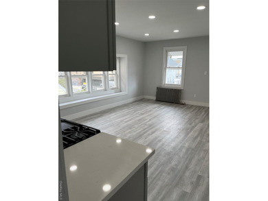 Welcome to this income-producing residential property in the - photo 30