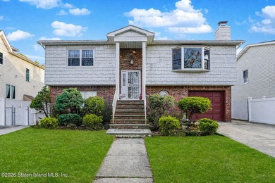 Discover 72 Reading Avenue-a two family Broadside Ranch tucked - photo 1