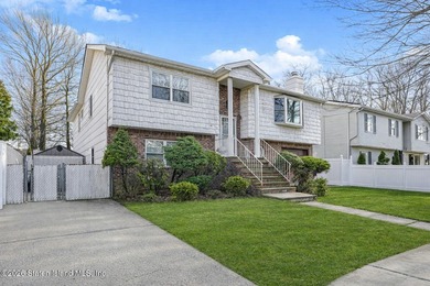 Discover 72 Reading Avenue-a two family Broadside Ranch tucked - photo 2