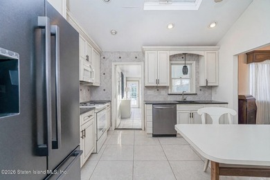 Discover 72 Reading Avenue-a two family Broadside Ranch tucked - photo 10