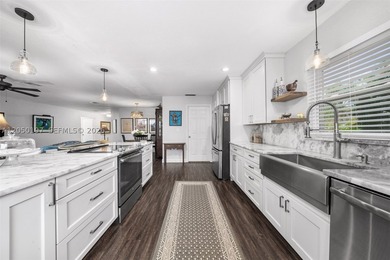 Rare Waterfront Opportunity Tastefully updated canal-front - photo 13