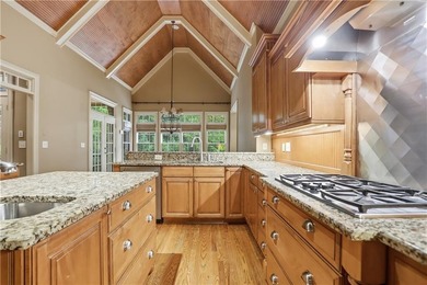 Nestled behind a sweeping lawn on a private, tree-lined lot - photo 15