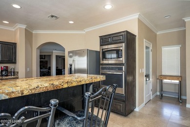 Nestled on the 4th fairway in RESIDENTIAL ESTATES, this stunning - photo 18