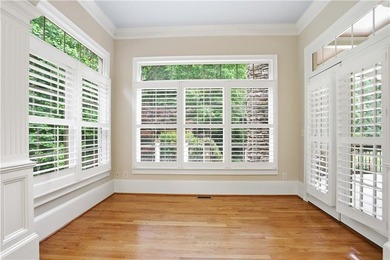 Nestled behind a sweeping lawn on a private, tree-lined lot - photo 19