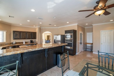 Nestled on the 4th fairway in RESIDENTIAL ESTATES, this stunning - photo 19