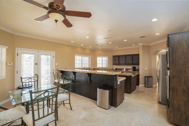 Nestled on the 4th fairway in RESIDENTIAL ESTATES, this stunning - photo 21