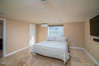 Nestled on the 4th fairway in RESIDENTIAL ESTATES, this stunning - photo 22