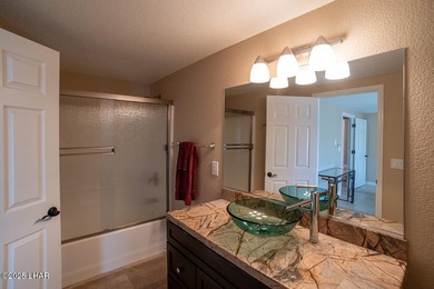 Nestled on the 4th fairway in RESIDENTIAL ESTATES, this stunning - photo 23