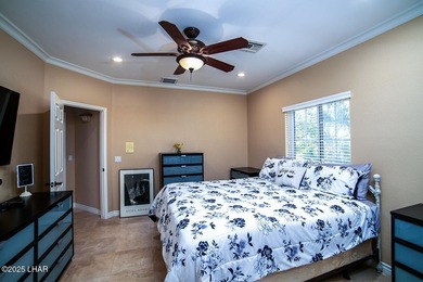 Nestled on the 4th fairway in RESIDENTIAL ESTATES, this stunning - photo 24