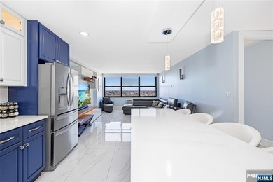 Experience upscale living in this expansive 1,337 sq. ft. condo
