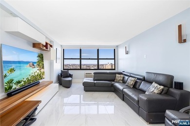 Experience upscale living in this expansive 1,337 sq. ft. condo