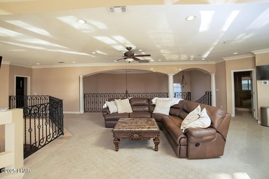 Nestled on the 4th fairway in RESIDENTIAL ESTATES, this stunning - photo 32