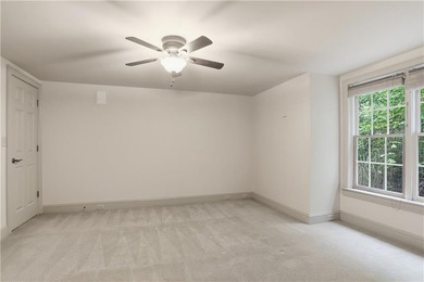 Nestled behind a sweeping lawn on a private, tree-lined lot - photo 33