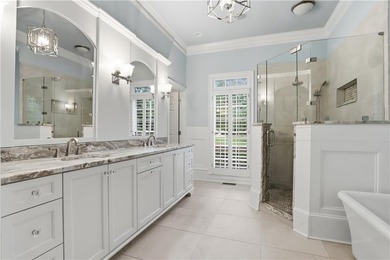 Nestled behind a sweeping lawn on a private, tree-lined lot - photo 34