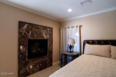 Nestled on the 4th fairway in RESIDENTIAL ESTATES, this stunning - photo 37