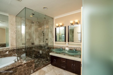 Nestled on the 4th fairway in RESIDENTIAL ESTATES, this stunning - photo 38