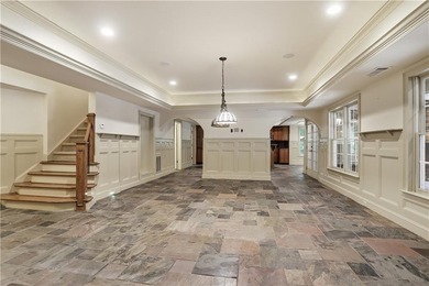 Nestled behind a sweeping lawn on a private, tree-lined lot - photo 42