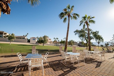 Nestled on the 4th fairway in RESIDENTIAL ESTATES, this stunning - photo 44
