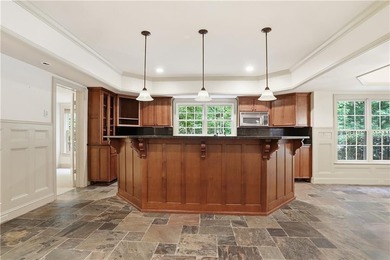 Nestled behind a sweeping lawn on a private, tree-lined lot - photo 46