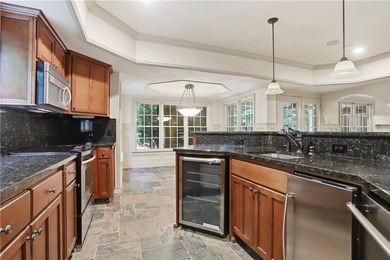 Nestled behind a sweeping lawn on a private, tree-lined lot - photo 48