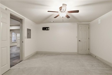 Nestled behind a sweeping lawn on a private, tree-lined lot - photo 49