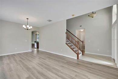 Welcome to this spacious two-story home set on a serene pond and - photo 8