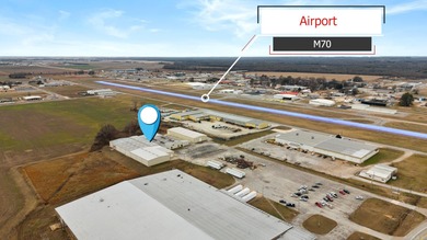 This property offers a manufacturing space and a separate, newer