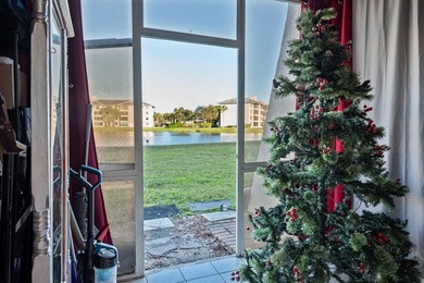Updated first-floor condo with stunning lake views & abundant - photo 13