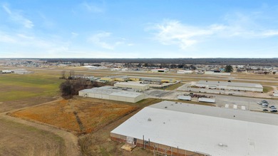 This property offers a manufacturing space and a separate, newer