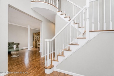 Welcome to this well maintained two-family detached side hall - photo 8