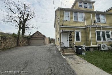 Excellent opportunity to own a two-family semi-attached home - photo 1