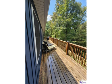 Escape to the beauty of Rough River with this charming 2-bedroom - photo 3