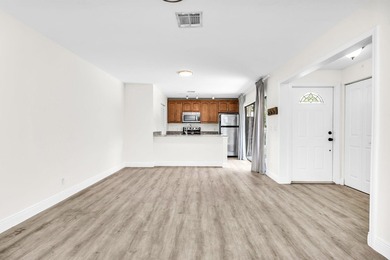 Beautifully updated two-story townhouse located in the highly - photo 13