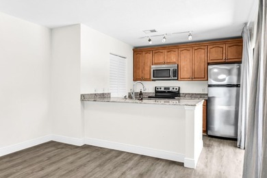 Beautifully updated two-story townhouse located in the highly - photo 14