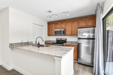 Beautifully updated two-story townhouse located in the highly - photo 15
