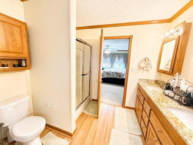 Experience stunning lakefront living in this spacious 4-bedroom - photo 15