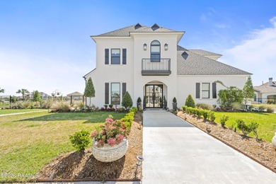 Located in the prestigious gated golf community of Le Triomphe