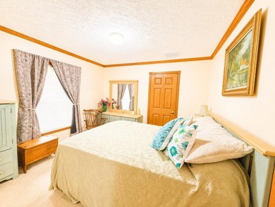 Experience stunning lakefront living in this spacious 4-bedroom - photo 21