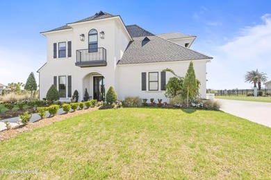 Located in the prestigious gated golf community of Le Triomphe