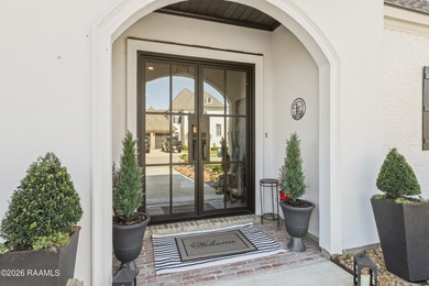 Located in the prestigious gated golf community of Le Triomphe