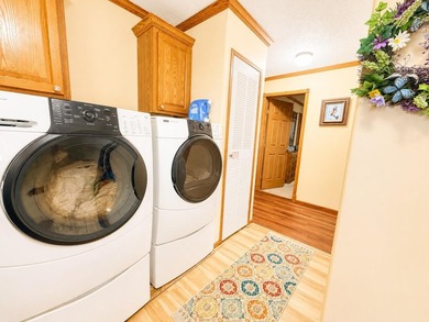 Experience stunning lakefront living in this spacious 4-bedroom - photo 23